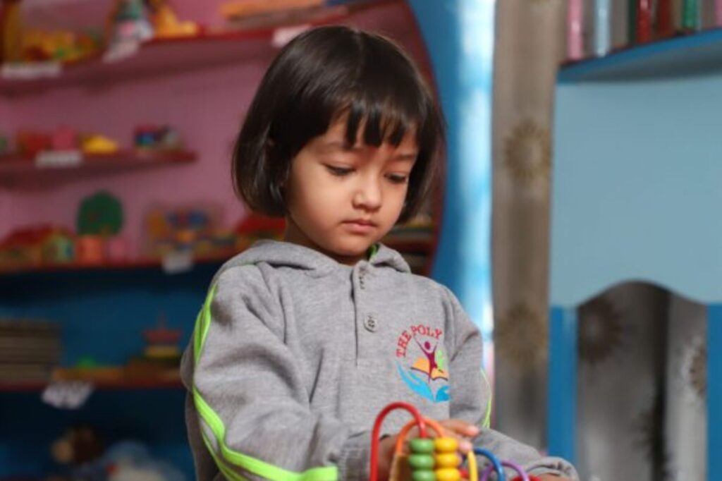 Preschool girl playing